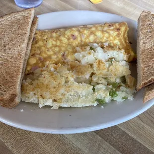 an omelet and toast on a plate