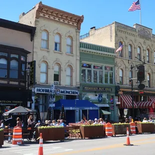 Vibrant patio scene on quaint Old World 3rd Street.