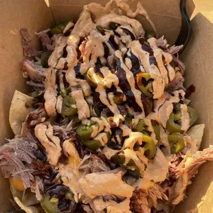 Pulled pork nachos are huge
