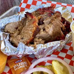 1/2 lb Smoked Brisket Plate w/ potato salad, coleslaw, corn muffin | $18.99