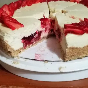 Amazing strawberry cheescake, you can get a 3lb cheesecake just like this for only $40!!!!! Slices $4
