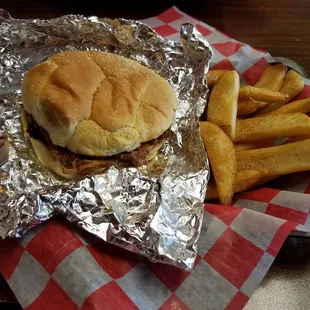 Pulled pork sandwich w/steak fries.