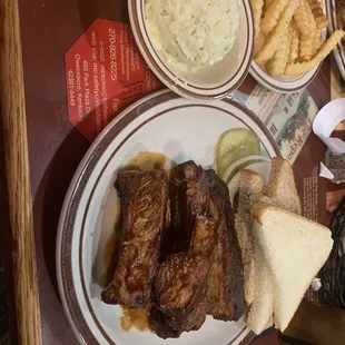 Rib plate with potato salad and fries