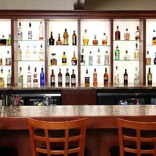 a bar with a lot of bottles
