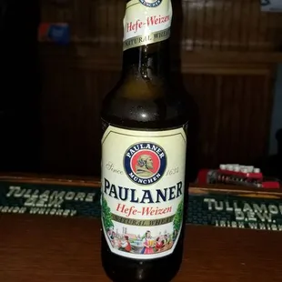 a beer bottle on a bar