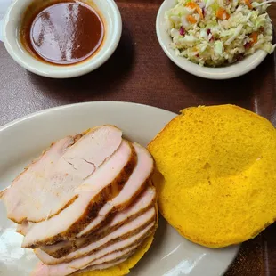 Turkey sandwich and coleslaw.