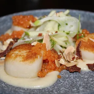 The Caesar Salad and Scallops were mediocre - we wouldn't order either again.