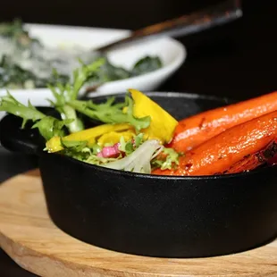 The spinach was over-seasoned and the baby carrots weren't cooked long enough.