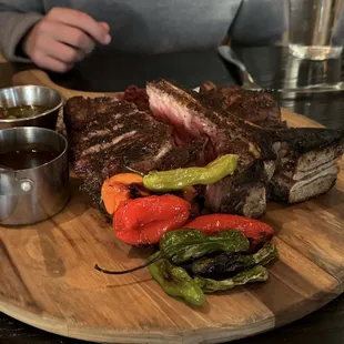 Dry Aged Porter House came with three sales and two sauces.