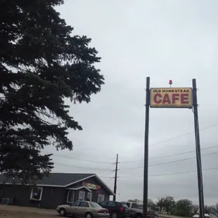 a car parked in front of the restaurant