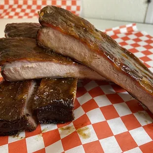 ribs on a red and white checkered napkin