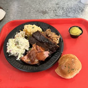 a plate of food on a red tray