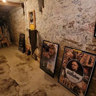 a hallway with posters