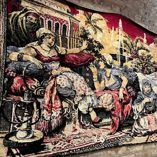 a tapestry depicting a scene from the bible