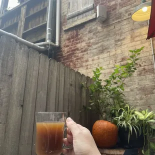 Patio with hot spiced cider mixed with bourbon