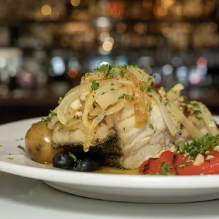 Bacalhau a Lagareiro - Grilled Cod Fillet, Onion, Garlic, Punched Potatoes, Roasted Peppers, Olive Oil