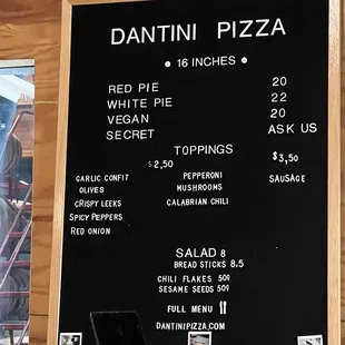 Menu for Dantini pizza! They have two secret pizzas every month and they&apos;re super funky and cool!