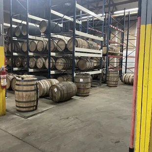 barrels stacked in a warehouse