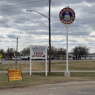 the sign for the old magnolia garage