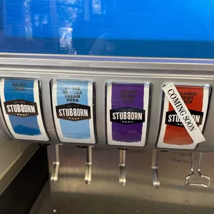 a row of ketchup containers