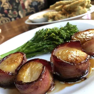Ask your server for any specials that may be available! Pictured: Bacon Wrapped Scallops with Broccolini.