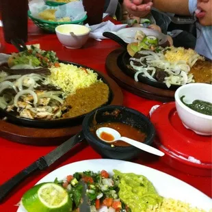 a family eating a meal at a restaurant