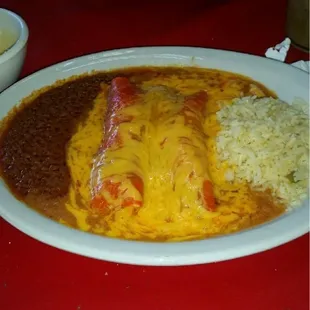 Two enchilada dinner with rice and beans.