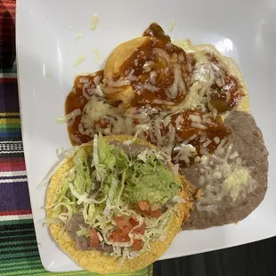 Vegetarian plate with chilli relleno, chalupa and enchilada.