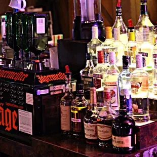 liquor bottles on a bar counter