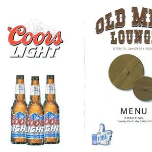 a menu and a bottle of coors light