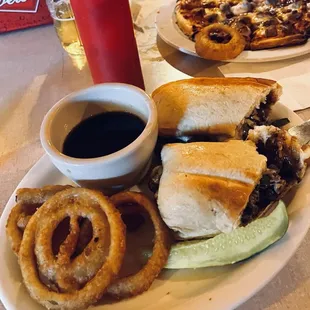 Philly Cheese steak sandwich was amazing. Came with Au jus sauce so kind of like their French dip but better.  Sooo good!!!