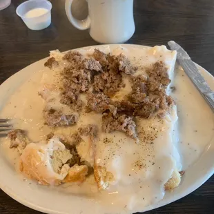 Broken sausage patty put in top of biscuit and white gravy?