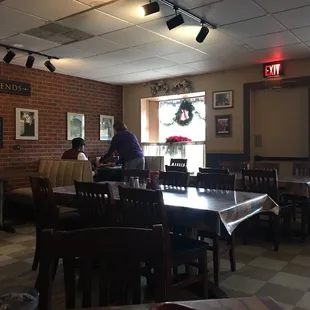 a dining room with tables and chairs