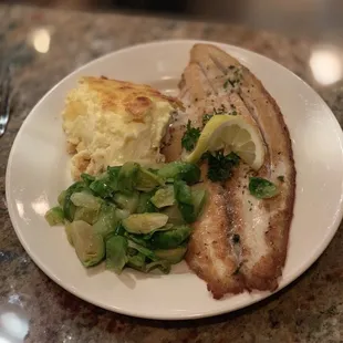 Pan seared Barramundi (like sea bass) with brown brussel sprouts and corn pudding (not pictured, dill aioli for the fish)