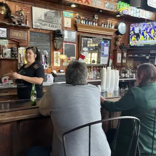 people sitting at the bar