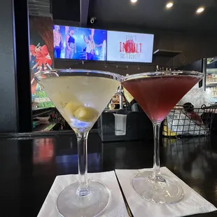 two martinis with olives