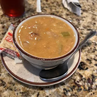 a bowl of soup on a plate