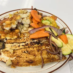 Pan fried trout plate (Lunch) with crispy home fries and veggies