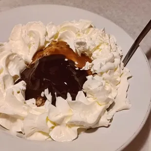 Pecan ball with carmel/ fudge sauce