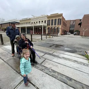 It's the brick building with the green trim (last building on the left in this picture).