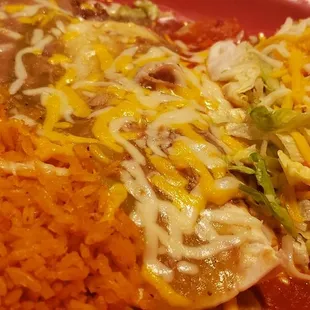 Combo #2-Shredded chicken taco, beef &amp; bean burrito, cheese enchilada with Brand &amp; rice...