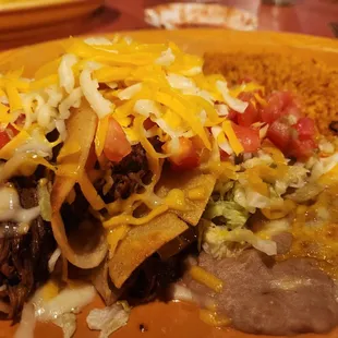 Taco Dorado - 3 deep fried tacos with refried beans and rice