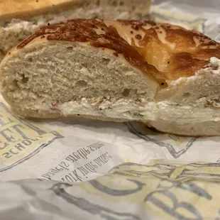 Bacon and Chive cream cheese on a Asiago bagel.