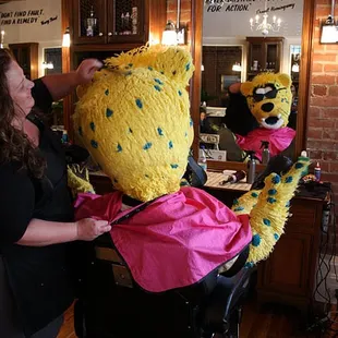 Jaxson De Ville getting a haircut at Old School Barber Shop