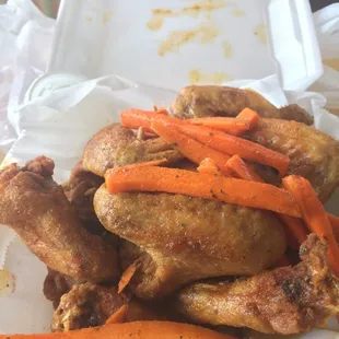 Seasoned whole wings. Fried perfectly and seasoned just right. Not a fancy place, but very clean.