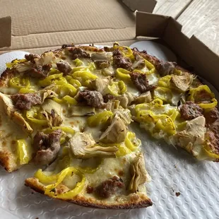 Gluten Free with Garlic Oil Sauce along with sausage, artichokes and banana peppers