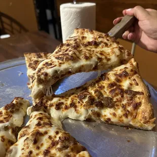 Sausage and pepperoni pizza with white sauce