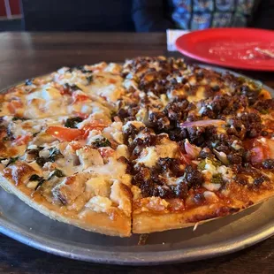 04/02/2024 - half Tuscany Chicken Pizza &amp; half Ragin Cajun Pizza