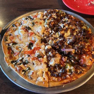 04/02/2024 - half Tuscany Chicken Pizza &amp; half Ragin Cajun Pizza