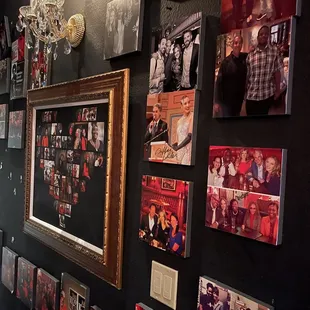 a wall full of family photos